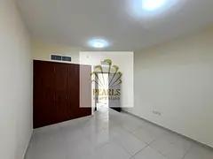 Largest 1BR apartment in Al Nuaimiya 2 near Gulfa Bridge. Prime location, 2 baths, balcony, built-in