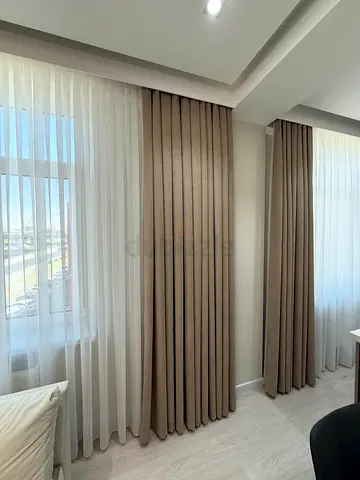 Pair of Beige Floor-Length Curtains with Sheer Liners -