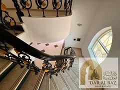 Villa for annual rent in Sharqan area, Sharjah. The villa has a master bedroom, 7 bathrooms, a maid