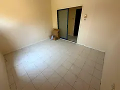 Two-bedroom apartment with a living room for annual rent – second row from Ajman Corniche, n