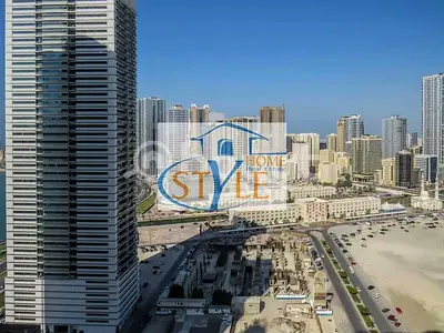 An apartment in Al Khan featuring a direct view of Al Khan Lake and another view of Al Qasba Canal.