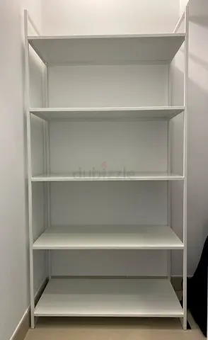 White metal storage shelf unit