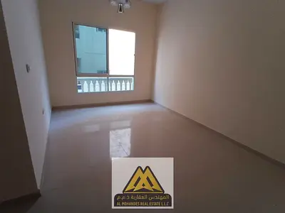 Annual Rent: 1-bedroom apartment in Al Hamidiya 1, second tenant, 2 bathrooms, central AC, free maintenance, prime location, AED 31,997, payable in 4