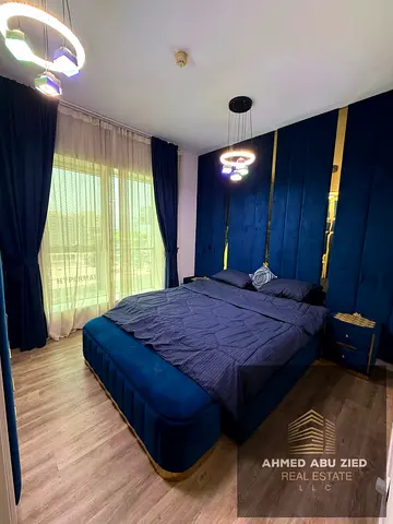 Stunning furnished 2BR in Oasis Towers Ajman. Spacious, 3 baths, open view balconies, gym, pool & parking included.