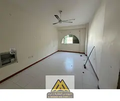 Annual Rent: 1-bedroom apartment in Al Rawda 3, master bedroom, 2 bathrooms, split AC, closed kitche