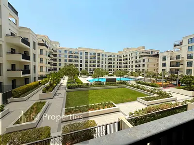 Spacious 1 BR apartment - furnished - balcony - wardrobes - coverd parking - swimming pool and gym