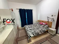 Furnished 1BR for annual rent in Al Nuaimiya, Ajman, with parking, near Safeer Mall & Corniche. Towe