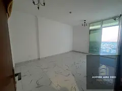 A distinctive 2BHK in Oasis Towers for annual rent, modern finishes, balcony, open view, spacious ar