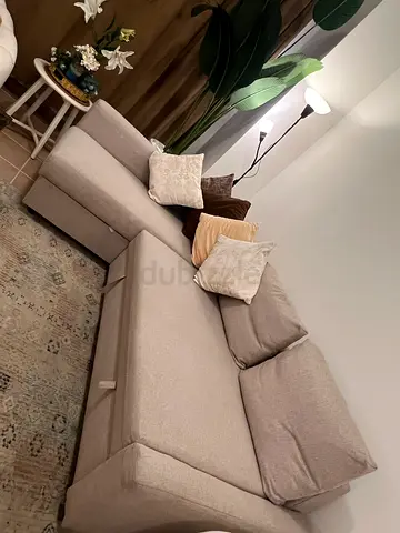 Beige L-shaped Convertible Sofa with Storage - Good Condition