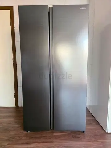 Samsung black Side by side refrigerator freezer