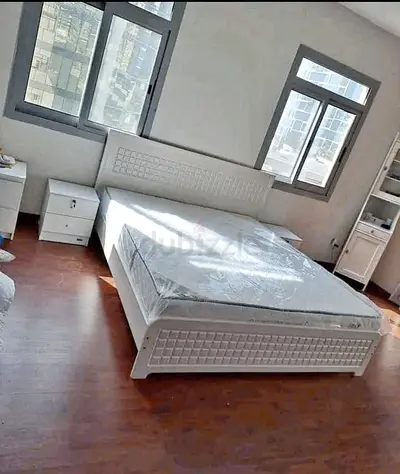Brand new King size wooden bed frame with Mattress Available