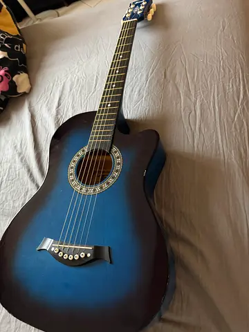 Blue acoustic-electric guitar (cutaway) in good condition
