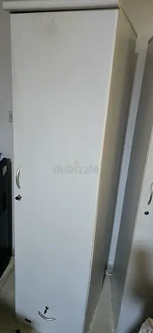 Tall white wardrobe / single-door cupboard in very good condition