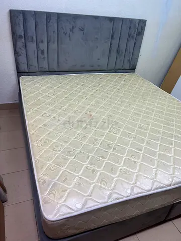 Grey upholstered bed frame with mattress - good condition