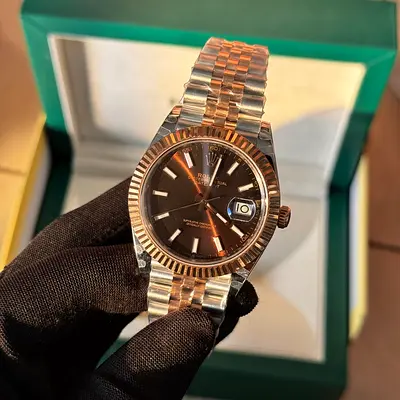 This is a Rolex Datejust 41, reference 126331, featuring a two-tone combination of stainless steel a