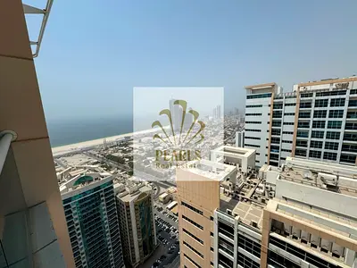 Largest 2BR Hall for Annual Rent in Ajman One Towers Al Rashidiya 3 with Sea View, 2 Master Bedrooms, 3 Baths and Parking