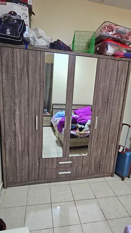 Large 4-Door Dark Wood Wardrobe with Drawers and center mirror