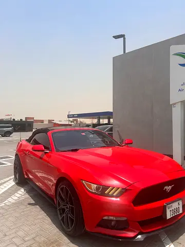 Red convertible Mustang