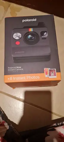 Brand new Generation 3 Polaroid camera with instant prints