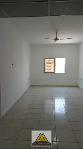 A spacious studio apartment with a separate kitchen in Al Nuaimiya 2, close to all services and main roads, with easy access to Dubai and Sharjah.
