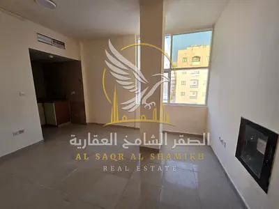 The largest studio with a separate kitchen, modern finishing, central AC, and central gas in Al Qulaya’a, Sharjah, for annual rent.