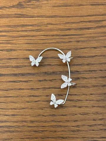 Silver butterfly earring with crystal accents - gently used