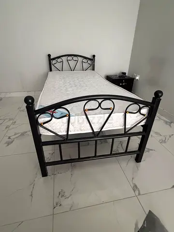 Bed with side table