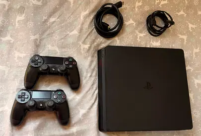 Sony PlayStation 4 Slim with DualShock 2 controller and HDMI cable