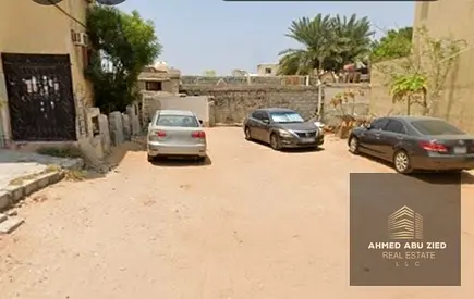 Residential investment plot for sale in Liwara 1, Ajman with G+4 building permit, 1,679 sqft area, prime location, excellent opportunity for investors