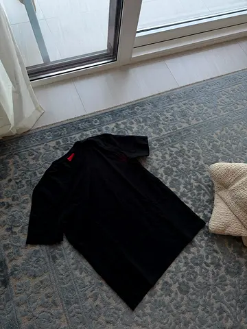 Plain black Boss short-sleeve T-shirt, gently used, size M