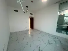 Spacious 2-bedroom apartment available for annual rent in Al Waha Tower, Ajman. Located on a high fl