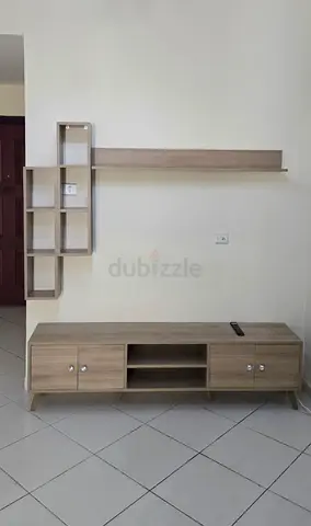 Wood TV unit with matching wall shelf and display cubbies - good condition
