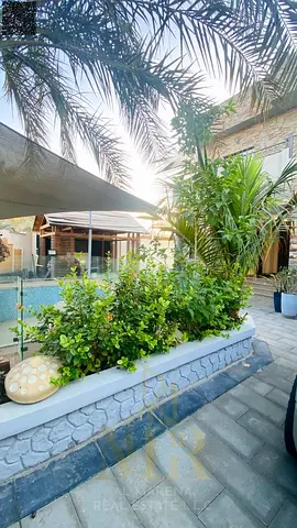 A villa with a price including electricity, water and air conditioning fees on the main street, rea