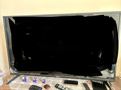 52-inch LED TV with remote and stand - good working condition