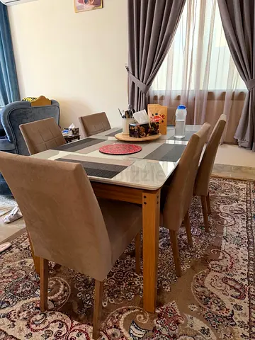 6 seat dining table with matching carpet