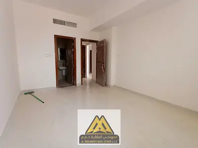 شقة غرفة وصالة للإيجار بالمويهات 3 عجمان، أول ساكن، بلكونة، حمامين، تكييف مركزي، صيانة مجانية، 39 ألف.
