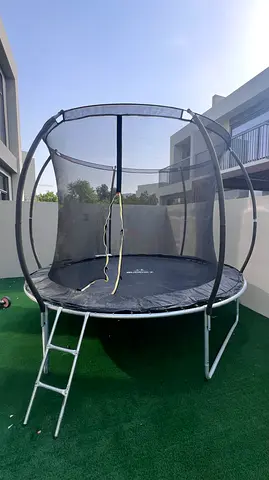 Used 10ft Round Trampoline with Safety Net and Ladder - Good Condition