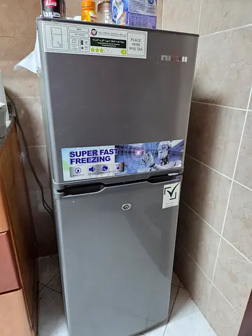 Used double-door freezer / refrigerator - stainless steel finish