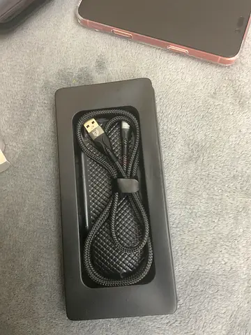 Micro USB Cable connects phone uses for charging and data transfer