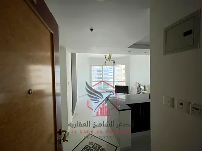 Free AC + 1 month + gym & pool | 1BR + living room, open view & built-in wardrobes | Near Dubai exit & all services.