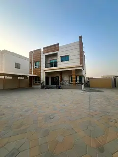 Al Hamidiya – Ajman: Corner commercial villa with a large setback, 7500 sq ft, 6 rooms, 2 kitchens