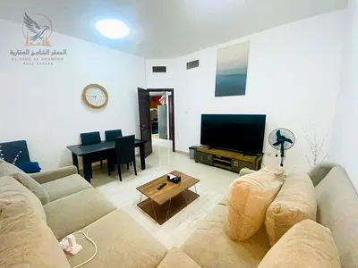 Furnished 1BR apartment in Al Khor Towers, 2 bathrooms, balcony, fully equipped, near Nesto, bills and internet included, easy Dubai access.