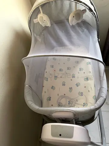 Lightweight electric baby bassinet with canopy and bluetooth connection
