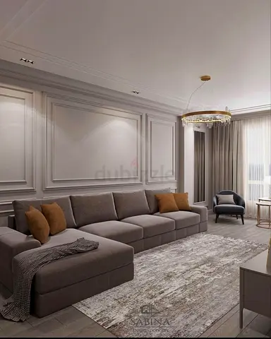 Large grey L-shaped sectional sofa with chaise