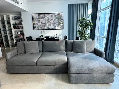 Comfortable Grey L-Shaped Fabric Sofa with Chaise - Good Condition
