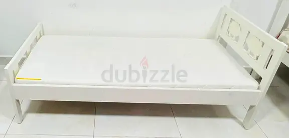 White wooden single bed frame