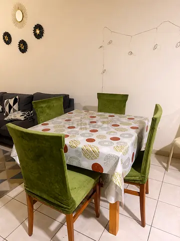 Solid wood dining table with 4 upholstered chairs - good condition