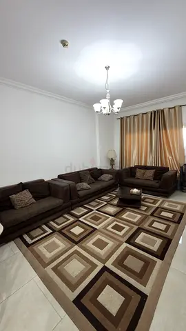 7 seaters brown fabric sofa with cushions - good condition