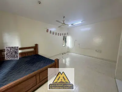 Annual Rent: Spacious studio in Al Nakheel 1, separate kitchen, split AC, second building from Ajma