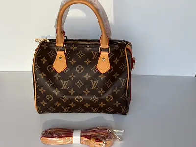 Louis Vuitton Monograms Handbag - Classic speedy (with Strap)